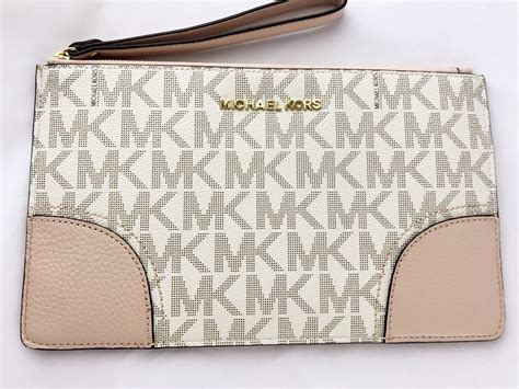 michael kors ballerina pink flap over clutch|Michael Kors clutch.